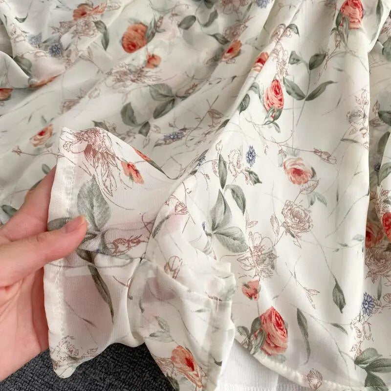 Macacão feminino estilo francês vintage floral estampado com decote em v e manga bufante