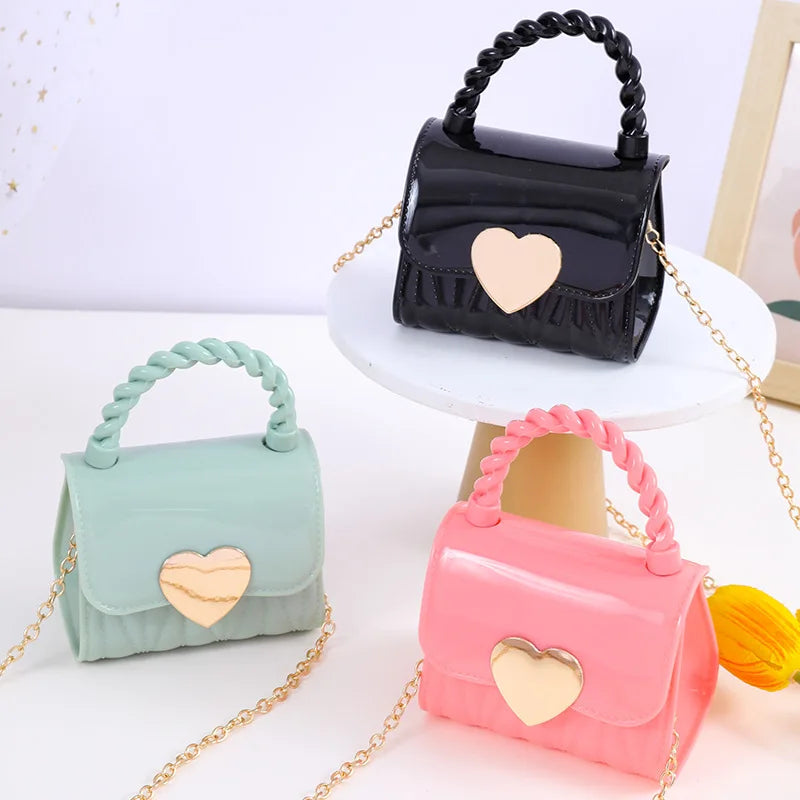 Mini bolsa de ombro fashion com fecho de coração para meninas 4-12 anos